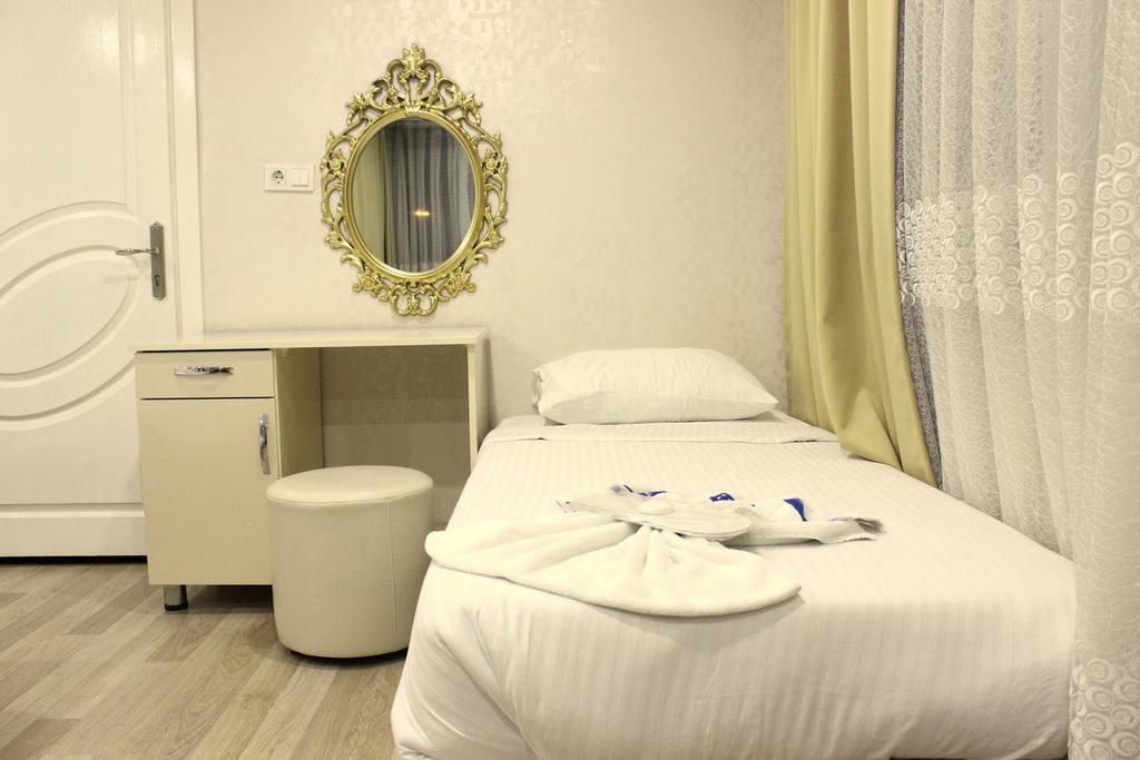 Simge Hotel Istanboel Kamer foto